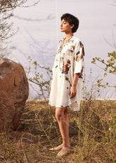 A Model Wearing White Cotton Mul Panchi Shirt,dress curated by Only Ethikal